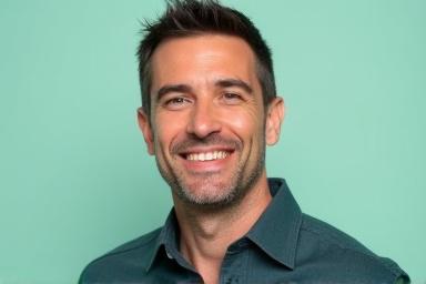 Professional headshot of David Rodriguez, a confident man with a thoughtful expression, symbolizing strength and guidance.